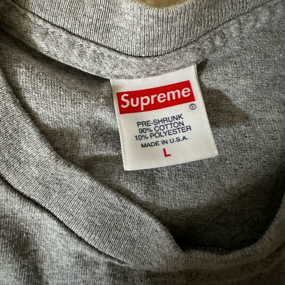 Supreme shirt men size large.